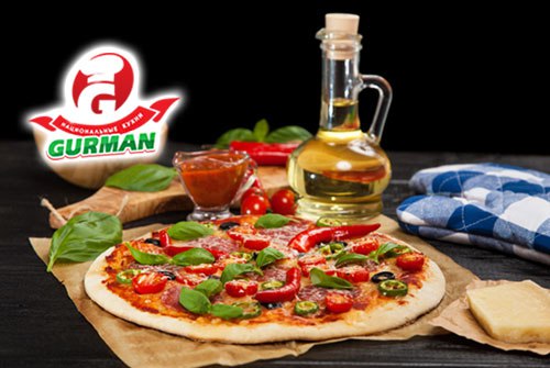 Пицца на черном и традиционном тесте со скидкой 50% от службы доставки еды «GURMAN»